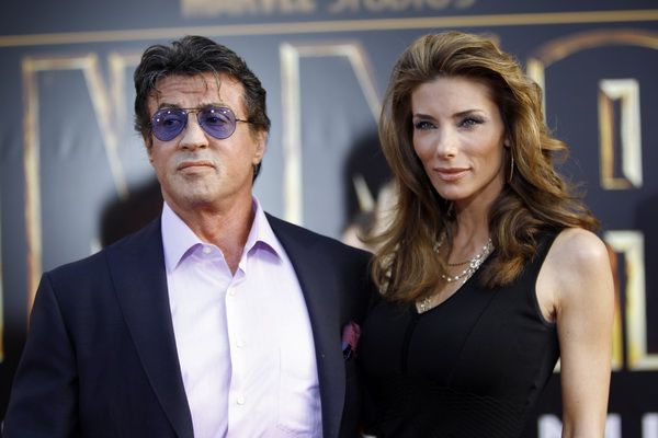 Stallone and his wife Jennifer Flavin pose at the premiere of "Iron Man 2" at El Capitan theatre in Hollywood